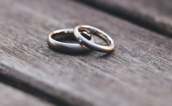 TWo wedding rings symbolisig teh romance of Heath arm near Great Tew